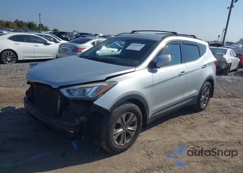 2015 Hyundai Santa Fe Sport 2.4L z USA, uszkodzony, nr VIN 5XYZUDLB7FG277165